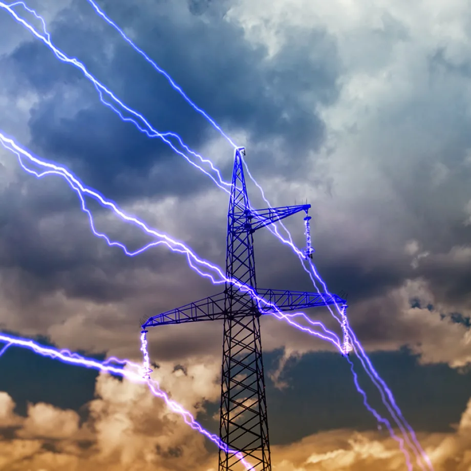 Electricity pylon on blue sky background.